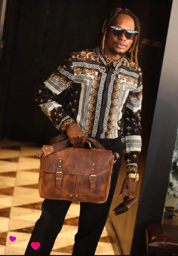 Model carrying Downtown Brief in Cognac leather, WACCO Studio Vancouver